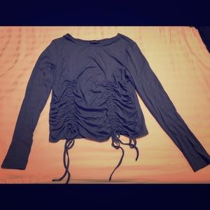 Long sleeved ribbed shirt with ruching